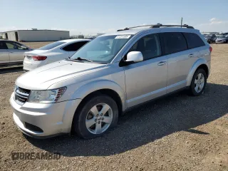 2013 Dodge Journey SE with VIN 3C4PDCAB1DT640831, listed as a Copart auction lot 61331395 with 136,126 mi miles and Salvage title. Bid and sale history available at DreamBid. Image 1.