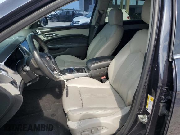 2016 Cadillac SRX Luxury Collection with VIN 3GYFNBE37GS516735, listed as a Copart auction lot 58193765 with 82,329 mi miles and Salvage title. Bid and sale history available at DreamBid. Image 7.