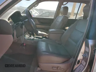 2002 Toyota Land Cruiser with VIN JTEHT05J122027769, listed as a Copart auction lot 76518004 with 151,767 mi miles and Salvage Title. Bid and sale history available at carsss.com. Image 7.