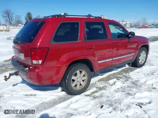 2010 Jeep Grand Cherokee Laredo with VIN 1J4RR4GT0AC135770, listed as a IAAI auction lot 41444149 with 226,746 mi miles. Bid and sale history available at carsss.com. Image 4.