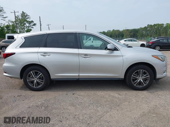 2020 Infiniti QX60 Luxe z VIN 5N1DL0MN9LC528083, wystawiony jako IAAI lot #42414461 z przebiegiem 87 812 mil mil oraz . Historia ofert i sprzedaży dostępna na DreamBid. Obrazek 13.