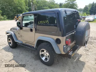 2004 Jeep Wrangler SE with VIN 1J4FA29164P797604, listed as a Copart auction lot 59978155 with 166,888 mi miles and Clean title. Bid and sale history available at DreamBid. Image 2.