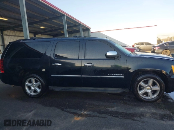 2010 Chevrolet Suburban LTZ with VIN 1GNUKKE37AR188966, listed as a IAAI auction lot 41833988 with 215,922 mi miles. Bid and sale history available at carsss.com. Image 13.