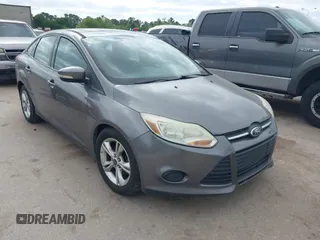 2014 Ford Focus SE with VIN 1FADP3F27EL139920, listed as a IAAI auction lot 42024617 with 143,223 mi miles. Bid and sale history available at carsss.com. Image 1.