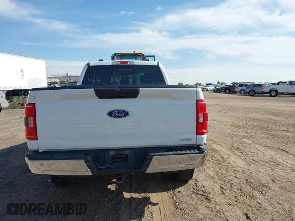2021 Ford F-150 XL with VIN 1FTFX1E84MKE55115, listed as a IAAI auction lot 42081695 with 115,219 mi miles and . Bid and sale history available at DreamBid. Image 16.
