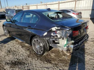 2020 BMW 5 Series 530e with VIN WBAJA9C01LCD78221, listed as a Copart auction lot 79264544 with 69,858 mi miles and Salvage Title. Bid and sale history available at DreamBid. Image 2.