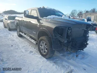 2022 Ram 2500 Laramie with VIN 3C6UR5FL9NG309997, listed as a IAAI auction lot 41346224 with 59,338 mi miles. Bid and sale history available at carsss.com. Image 1.
