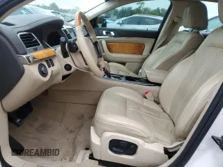 2011 Lincoln MKS z VIN 1LNHL9DRXBG609478, wystawiony jako Copart lot #57226135 z przebiegiem 178 372 mil mil oraz Szkoda całkowita • Salvage title. Historia ofert i sprzedaży dostępna na DreamBid. Obrazek 7.