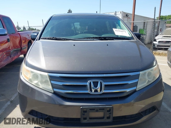 2012 Honda Odyssey EX-L with VIN 5FNRL5H65CB012428, listed as a IAAI auction lot 42164272 with 256,253 mi miles and . Bid and sale history available at carsss.com. Image 12.