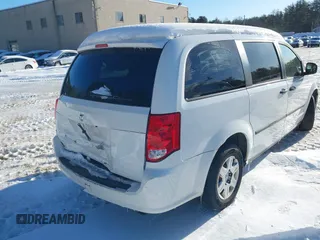 2014 Ram Cargo Van Tradesman with VIN 2C4JRGAG7ER101533, listed as a IAAI auction lot 41547249 with 132,529 mi miles. Bid and sale history available at carsss.com. Image 4.