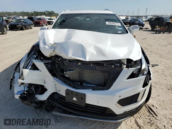 2024 Cadillac XT5 FWD Premium Luxury with VIN 1GYKNCRS1RZ735184, listed as a Copart auction lot 80688374 with 10,587 mi miles and Salvage Title. Bid and sale history available at carsss.com. Image 5.