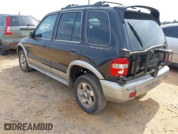 2000 Kia Sportage with VIN KNDJB7236Y5685392, listed as a IAAI auction lot 41785012 with 183,445 mi miles. Bid and sale history available at carsss.com. Image 3.