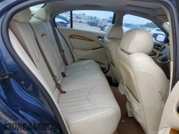 2000 Jaguar S-Type V6 z VIN SAJDA01C1YFL61738, wystawiony jako Copart lot #60363845 z przebiegiem 114 996 mil mil oraz Czysty tytuł • Clean title. Historia ofert i sprzedaży dostępna na DreamBid. Obrazek 10.