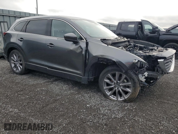 2023 Mazda CX-9 Touring with VIN JM3TCBCY4P0654597, listed as a Copart auction lot 55920855 with 58,534 mi miles and Salvage title. Bid and sale history available at DreamBid. Image 4.