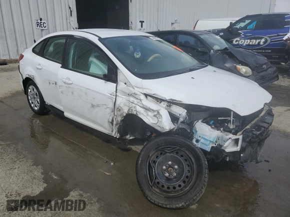 2012 Ford Focus SE with VIN 1FAHP3F21CL389667, listed as a Copart auction lot 49953185 with 44,268 mi miles and Salvage Title. Bid and sale history available at DreamBid. Image 4.