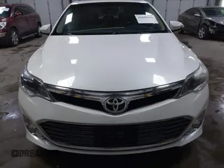 2014 Toyota Avalon Limited with VIN 4T1BK1EB6EU100635, listed as a IAAI auction lot 41609581 with 128,609 mi miles. Bid and sale history available at carsss.com. Image 12.
