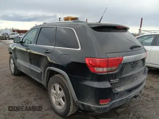 2011 Jeep Grand Cherokee Laredo z VIN 1J4RR4GG5BC508211, wystawiony jako Copart lot #53729935 z przebiegiem 124 408 mil mil oraz Szkoda całkowita • Salvage title. Historia ofert i sprzedaży dostępna na DreamBid. Obrazek 2.