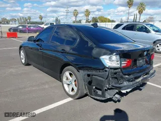 2013 BMW 3 Series 328i with VIN WBA3C1G53DNR44733, listed as a IAAI auction lot 41690337 with 129,704 mi miles. Bid and sale history available at carsss.com. Image 3.