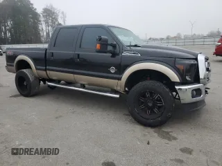 2012 Ford F-250 XL with VIN 1FT7W2BTXCEC92408, listed as a Copart auction lot 49335635 with 218,785 mi miles and Salvage Title. Bid and sale history available at DreamBid. Image 4.