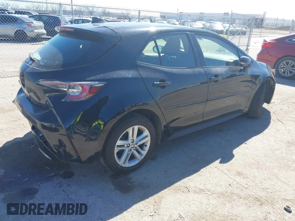 2021 Toyota Corolla SE with VIN JTND4MBE3M3144552, listed as a IAAI auction lot 41699317 with 57,309 mi miles and . Bid and sale history available at DreamBid. Image 4.