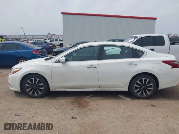 2018 Nissan Altima SV with VIN 1N4AL3AP2JC241377, listed as a IAAI auction lot 41782081 with 131,849 mi miles and . Bid and sale history available at DreamBid. Image 14.