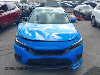 2024 Honda Civic Sport Touring z VIN 19XFL1G86RE029798, wystawiony jako IAAI lot #41469492 z przebiegiem 13 104 mil mil oraz . Historia ofert i sprzedaży dostępna na DreamBid. Obrazek 12.