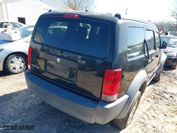 2007 Dodge Nitro SXT with VIN 1D8GT28K07W544174, listed as a IAAI auction lot 41579998 with 187,560 mi miles. Bid and sale history available at carsss.com. Image 4.