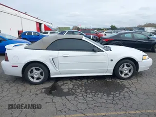 2004 Ford Mustang Deluxe with VIN 1FAFP446X4F134860, listed as a IAAI auction lot 41755643 with 174,410 mi miles. Bid and sale history available at carsss.com. Image 13.