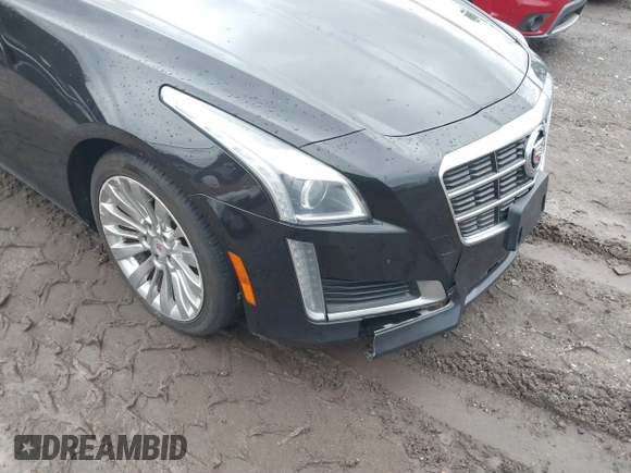 2014 Cadillac CTS Luxury AWD with VIN 1G6AX5SX9E0195923, listed as a IAAI auction lot 40946334 with Not Provided miles and . Bid and sale history available at carsss.com. Image 6.