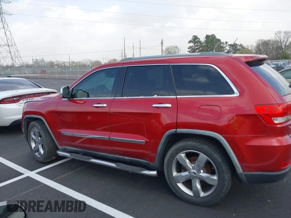 2011 Jeep Grand Cherokee Overland with VIN 1J4RS6GT4BC561169, listed as a IAAI auction lot 41847912 with 220,713 mi miles and . Bid and sale history available at DreamBid. Image 14.