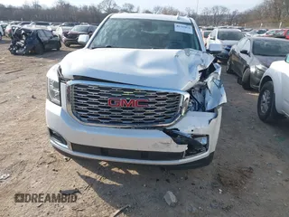 2020 GMC Yukon XL Denali with VIN 1GKS1HKJ6LR282854, listed as a IAAI auction lot 41717072 with 56,715 mi miles and . Bid and sale history available at DreamBid. Image 12.