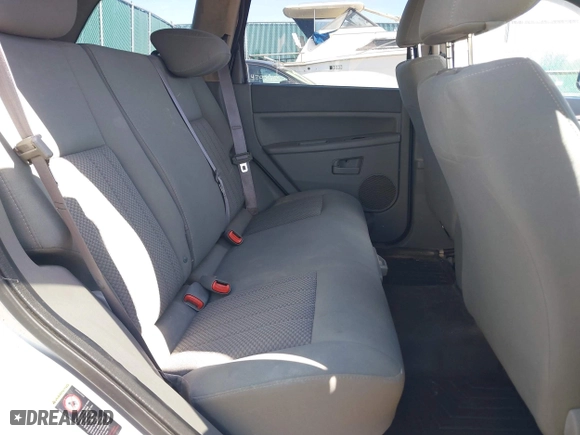 2005 Jeep Grand Cherokee Laredo with VIN 1J8GR48K25C667992, listed as a IAAI auction lot 42094246 with 281,242 mi miles. Bid and sale history available at carsss.com. Image 8.
