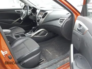 2013 Hyundai Veloster RE:MIX with VIN KMHTC6AD5DU106088, listed as a IAAI auction lot 41904678 with 213,478 mi miles and . Bid and sale history available at DreamBid. Image 5.