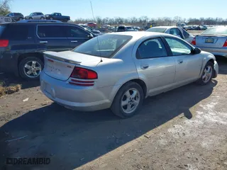 2004 Dodge Stratus SXT with VIN 1B3EL46X64N128617, listed as a IAAI auction lot 41584871 with 140,316 mi miles. Bid and sale history available at carsss.com. Image 4.