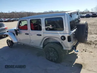2024 Jeep Wrangler Sahara with VIN 1C4RJXP63RW195206, listed as a Copart auction lot 48784595 with 10,737 mi miles and Salvage Title. Bid and sale history available at DreamBid. Image 2.