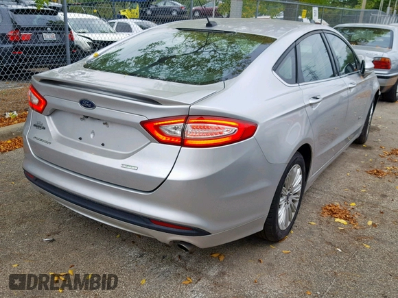 2016 Ford Fusion SE Hybrid with VIN 3FA6P0LUXGR397589, listed as a Copart auction lot 58180612 with 72,400 mi miles and Salvage Title. Bid and sale history available at carsss.com. Image 4.