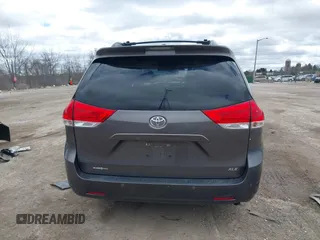 2014 Toyota Sienna XLE with VIN 5TDYK3DC0ES422700, listed as a IAAI auction lot 42049181 with 147,498 mi miles. Bid and sale history available at carsss.com. Image 16.