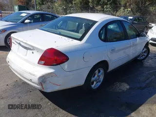 2003 Ford Taurus SE Standard with VIN 1FAFP53293G270314, listed as a IAAI auction lot 41840424 with 171,840 mi miles. Bid and sale history available at carsss.com. Image 4.