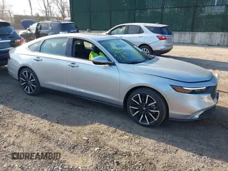 2025 Honda Accord Touring with VIN 1HGCY2F8XSA022651, listed as a IAAI auction lot 42081683 with 1,328 mi miles and . Bid and sale history available at DreamBid. Image 1.
