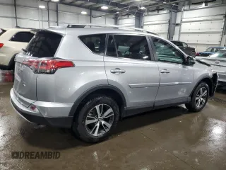 2016 Toyota RAV4 XLE with VIN 2T3RFREV9GW463274, listed as a Copart auction lot 59784805 with 99,138 mi miles and Salvage title. Bid and sale history available at DreamBid. Image 3.