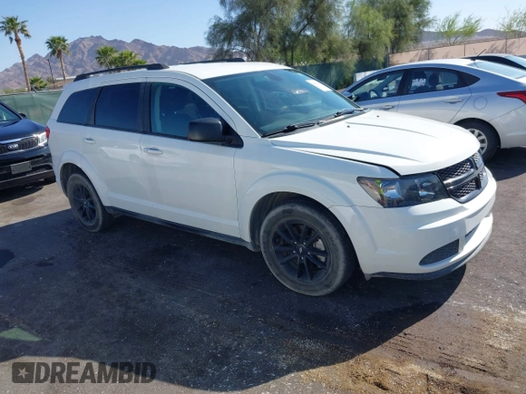 2020 Dodge Journey SE Value with VIN 3C4PDCAB2LT273467, listed as a IAAI auction lot 42001467 with 67,267 mi miles and . Bid and sale history available at carsss.com. Image 1.