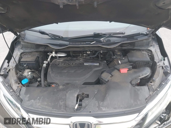2018 Honda Odyssey Touring with VIN 5FNRL6H89JB057148, listed as a IAAI auction lot 42511909 with 166,438 mi miles and . Bid and sale history available at DreamBid. Image 10.