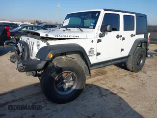 2013 Jeep Wrangler Unlimited Rubicon with VIN 1C4BJWFG0DL529739, listed as a IAAI auction lot 41587047 with 93,116 mi miles. Bid and sale history available at carsss.com. Image 2.