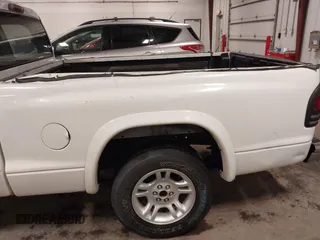 2002 Dodge Dakota SLT with VIN 1B7GL42X32S632375, listed as a IAAI auction lot 39909886 with 181,521 mi miles. Bid and sale history available at carsss.com. Image 20.