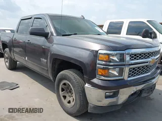 2015 Chevrolet Silverado 1500 LT with VIN 3GCPCREC7FG411610, listed as a IAAI auction lot 41975360 with 243,335 mi miles and . Bid and sale history available at DreamBid. Image 1.