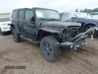 2015 Jeep Wrangler Unlimited Freedom z VIN 1C4BJWDG2FL652562, wystawiony jako IAAI lot #42592008 z przebiegiem 23 711 mil mil oraz . Historia ofert i sprzedaży dostępna na DreamBid. Obrazek 1.