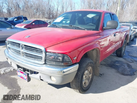 1999 Dodge Dakota SLT with VIN 1B7GG22Y3XS289253, listed as a IAAI auction lot 41283728 with 154,038 mi miles and . Bid and sale history available at carsss.com. Image 2.
