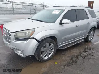 2014 GMC Acadia Denali with VIN 1GKKRTKD3EJ138797, listed as a IAAI auction lot 41910495 with 107,301 mi miles. Bid and sale history available at carsss.com. Image 2.