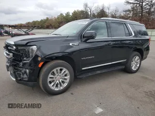 2022 GMC Yukon SLT with VIN 1GKS2BKD0NR290942, listed as a Copart auction lot 82338794 with 26,392 mi miles and Salvage Title. Bid and sale history available at carsss.com. Image 1.