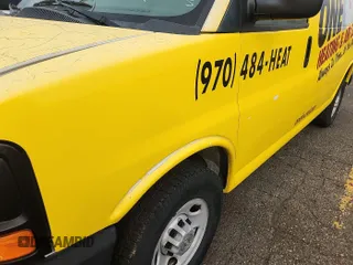 2014 Chevrolet Express Cargo Van with VIN 1GCWGFCA2E1121515, listed as a IAAI auction lot 42191150 with 122,706 mi miles. Bid and sale history available at carsss.com. Image 1.